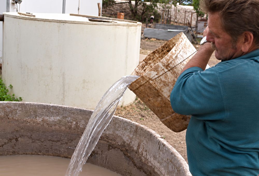 Clay-affected water being poured